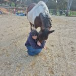 Emily sharing a tender moment with Halo